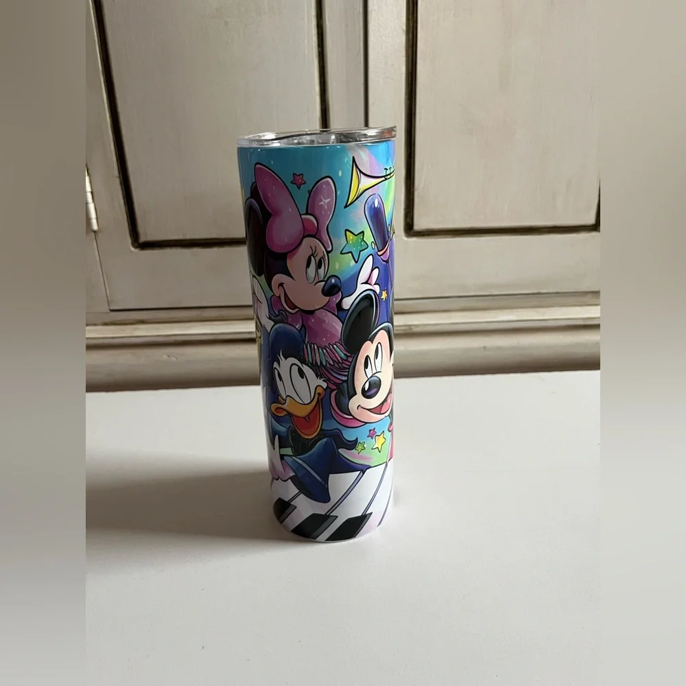 New 20-oz tumbler cup Mickey Mouse, Goofy, Pluto & friends in a musical theme.